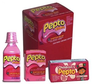 A box of pepto-bismol and two packets of children 's drink.